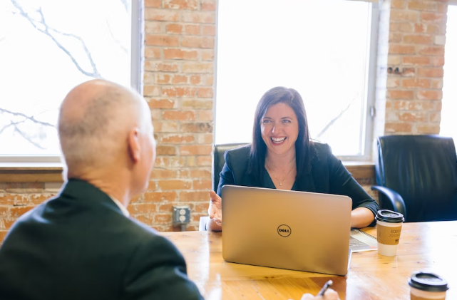 Two people in a meeting