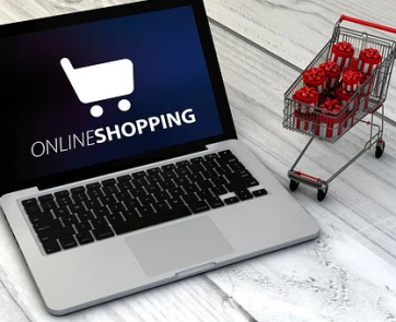 Laptop with online shopping logo