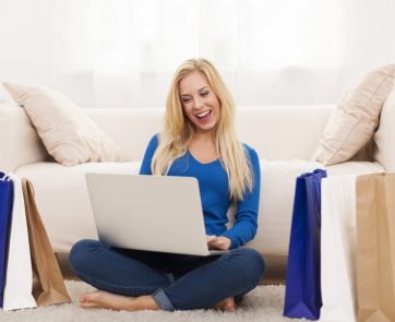 Happy woman from online shopping